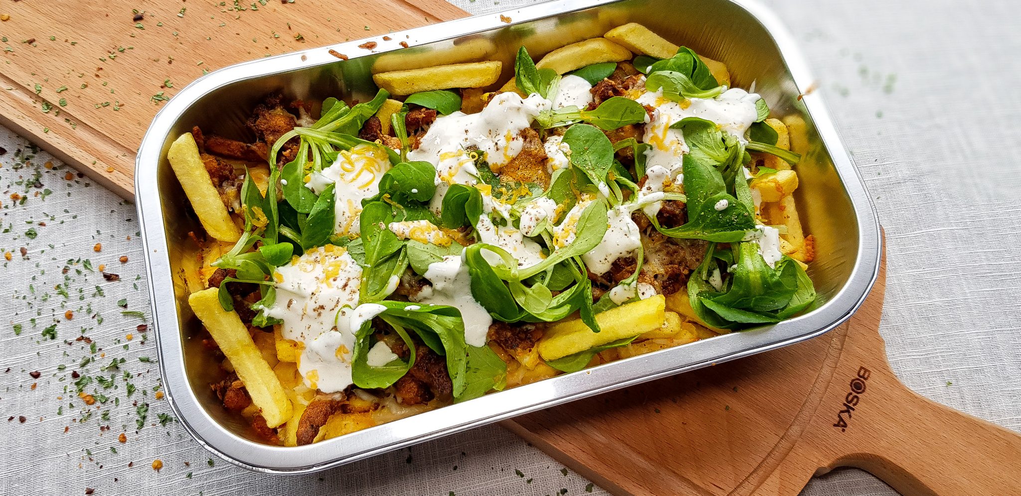 Zelfgemaakte kapsalon van kipshoarma